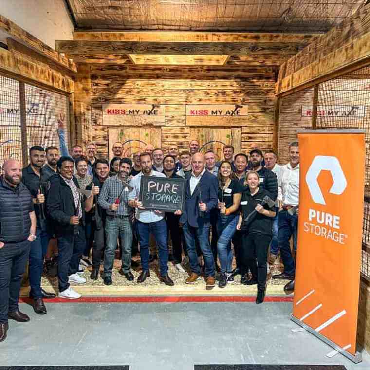 a group of people standing in front of a building