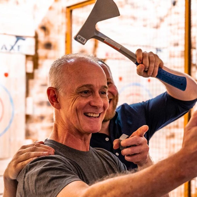 a man holding a baseball bat