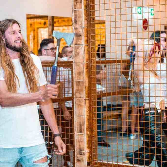 a group of people in a cage