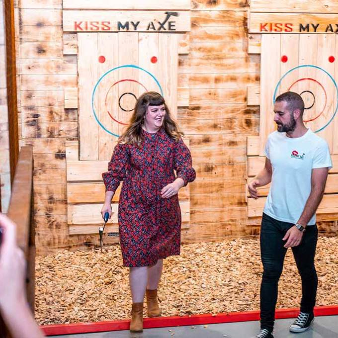 a group of people standing in front of a building