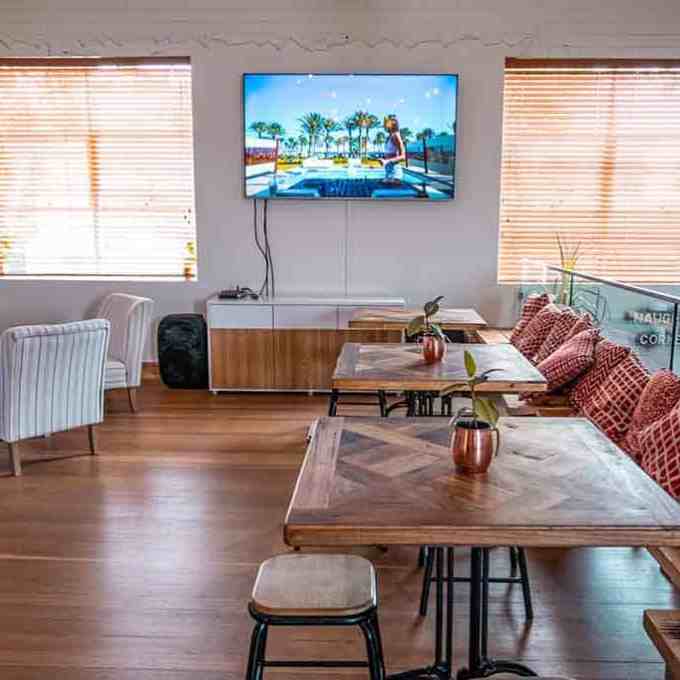 a living room filled with furniture and a fire place