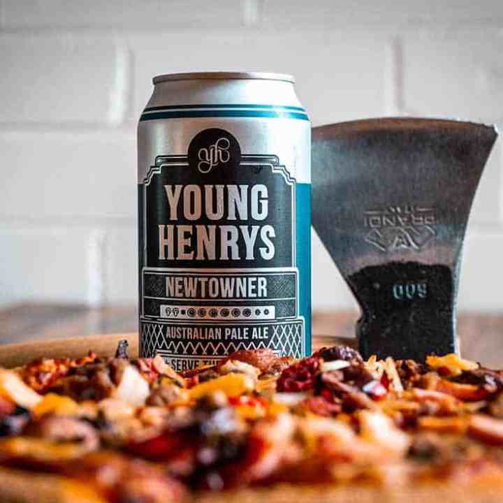 a close up of a slice of pizza sitting on top of a counter