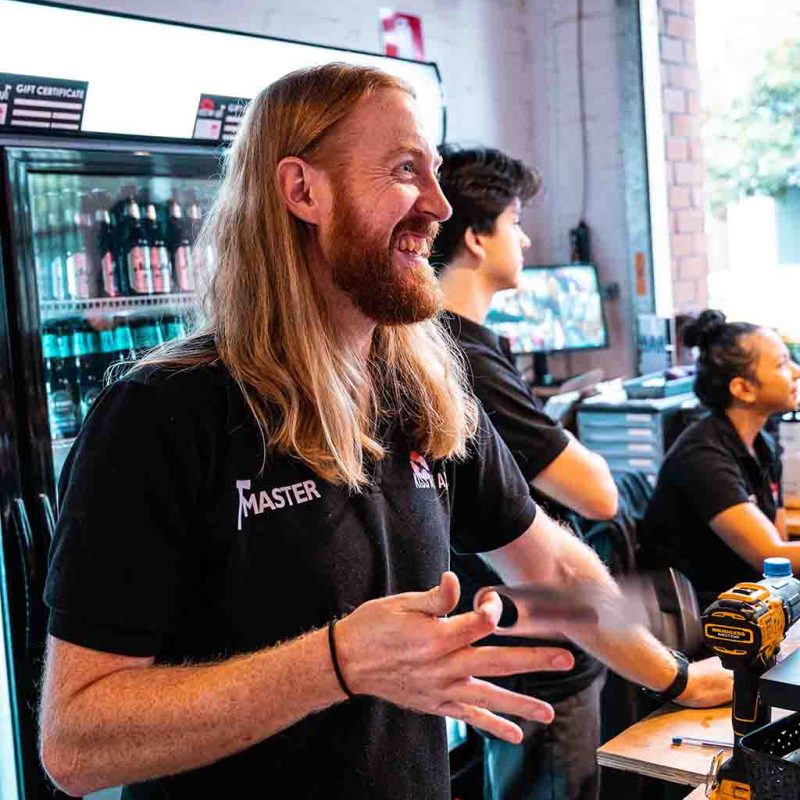 a man and a woman sitting at a table in a restaurant