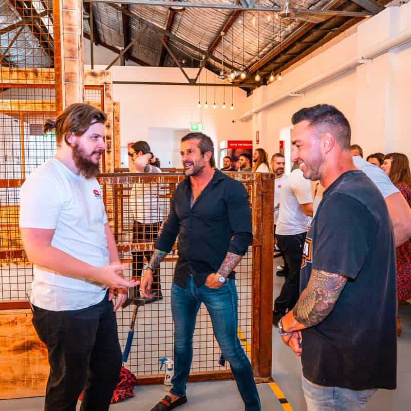 a group of people standing in a room