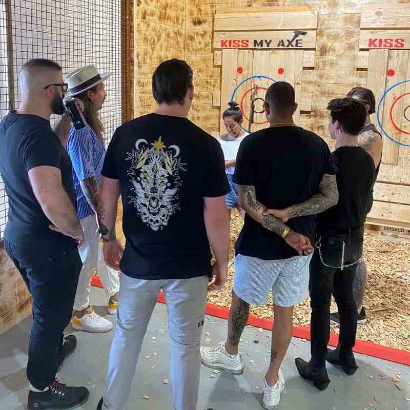 a group of people standing in front of a building