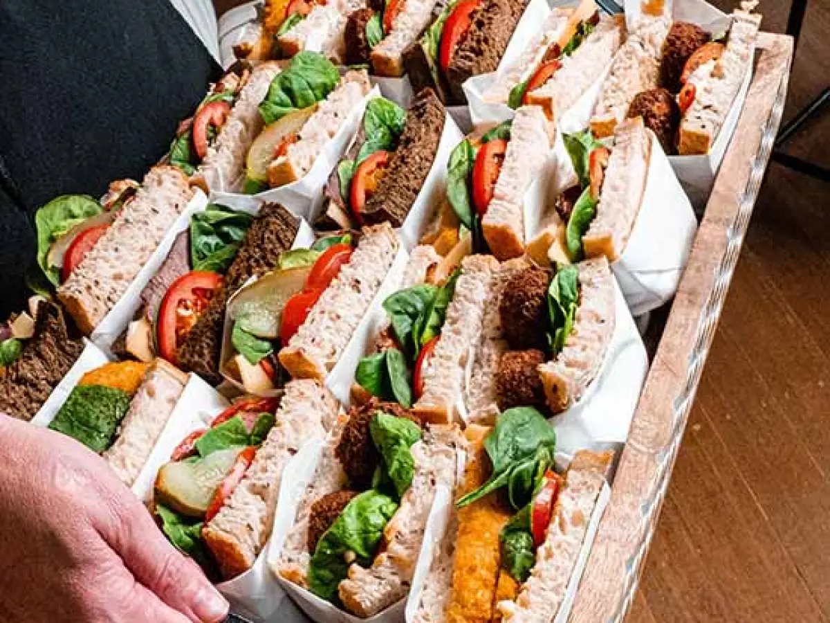 a person cutting food on a table