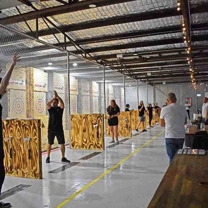a group of people standing in front of a building