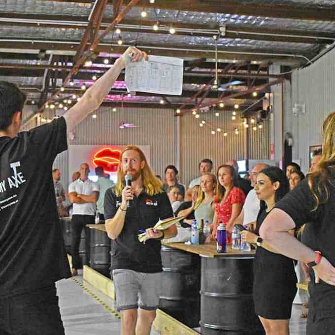 a group of people standing in a room