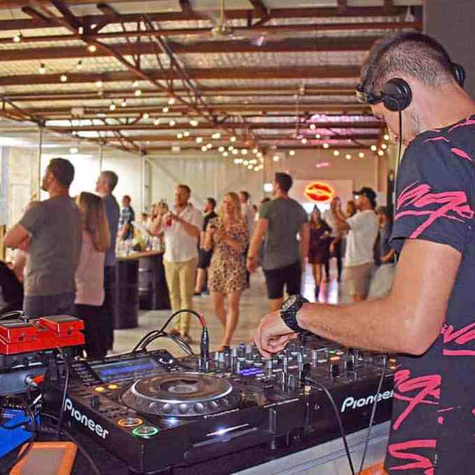 a group of people standing in a room