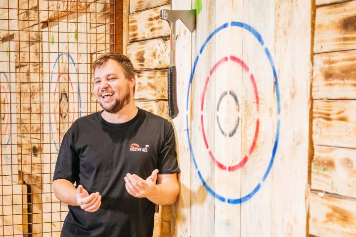 a man standing in front of a building