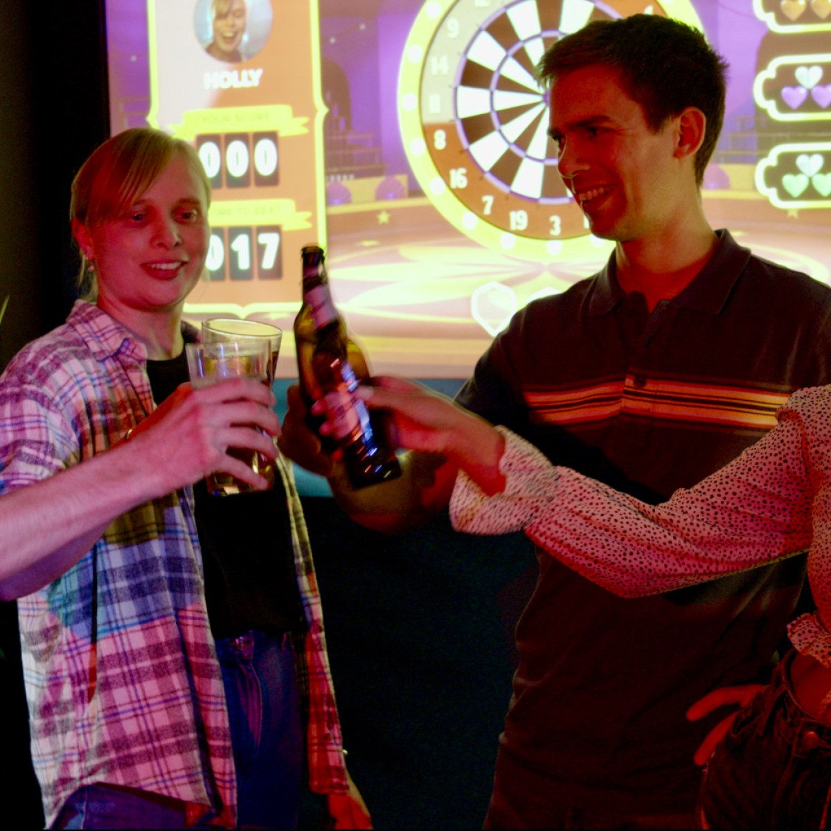 a couple of people that are standing in a room