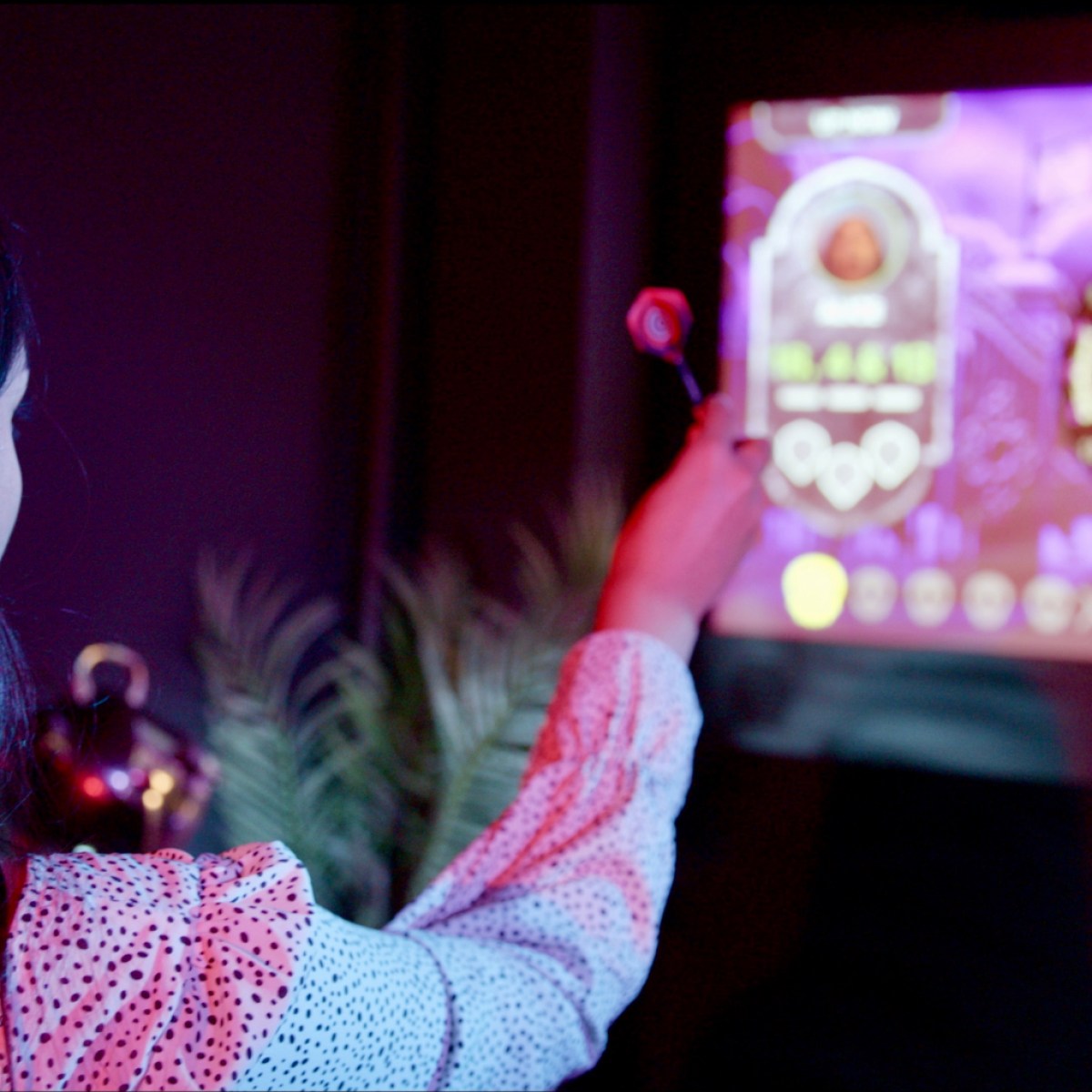 a woman taking a selfie in a dark room