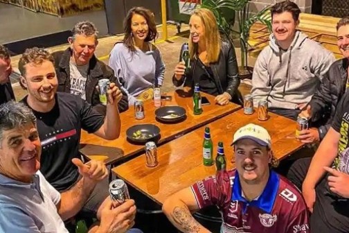 a group of people around a table